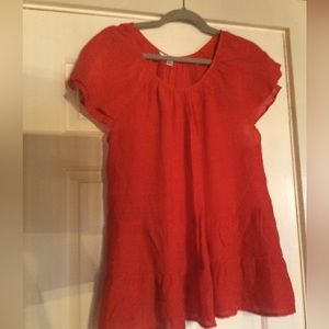 Cute, red top. Like new. Light weight and is tiered. Layered sleeve.